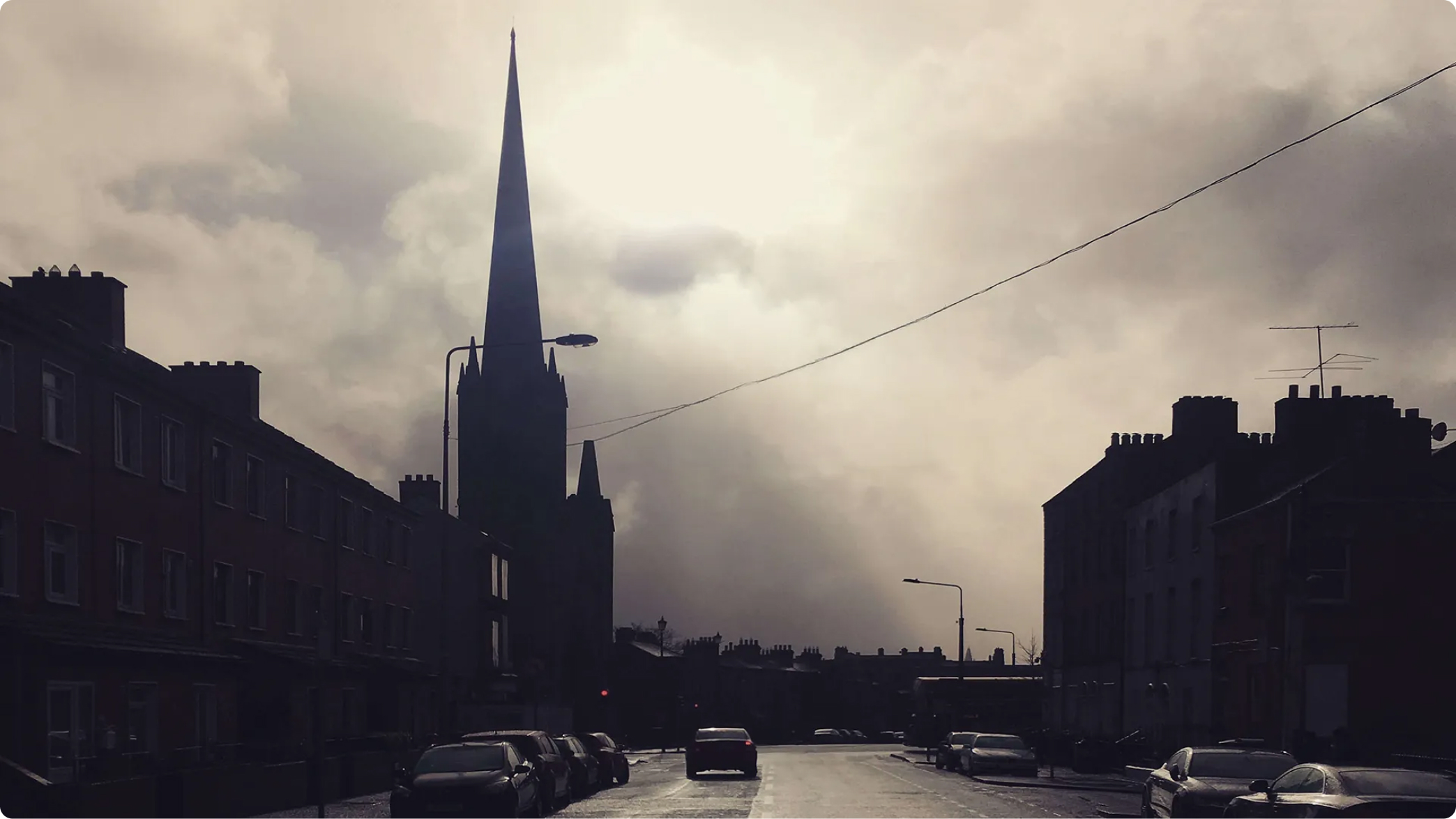 A Dublin street with a church spire
